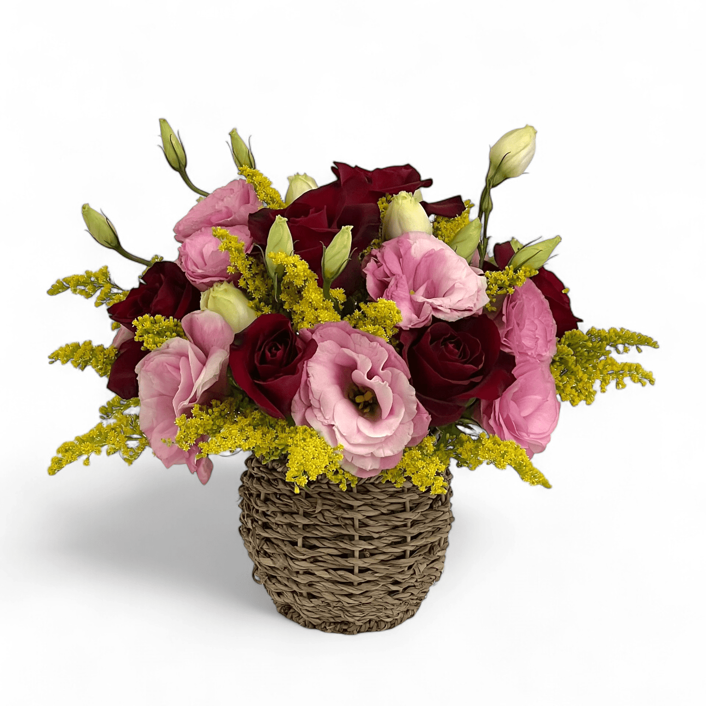 Close-up of Rosy Romance flower arrangement featuring red roses and pink eustoma in a small basket, ideal as a romantic flower gift.