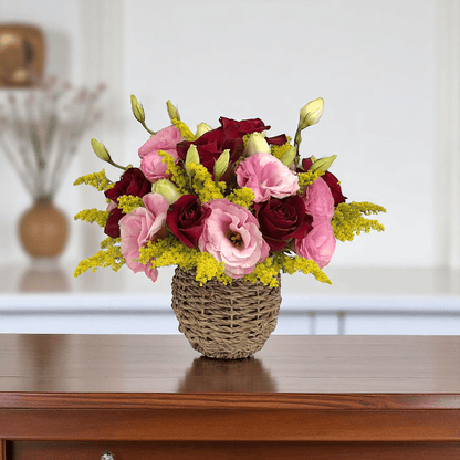 Front view of Rosy Romance flower basket with red roses and pink eustoma, arranged in a compact romantic gift basket.